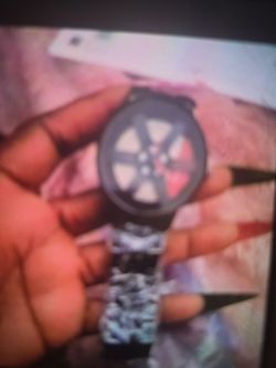 I have band new men watch make with steel car rims style band new with a box