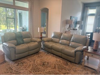 Reclining leather couch , sofa and end tables