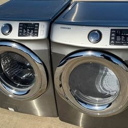Graphite steel front load washer and dryer electric  high efficiency working perfectly with warranty extra for delivery same day delivery and installa