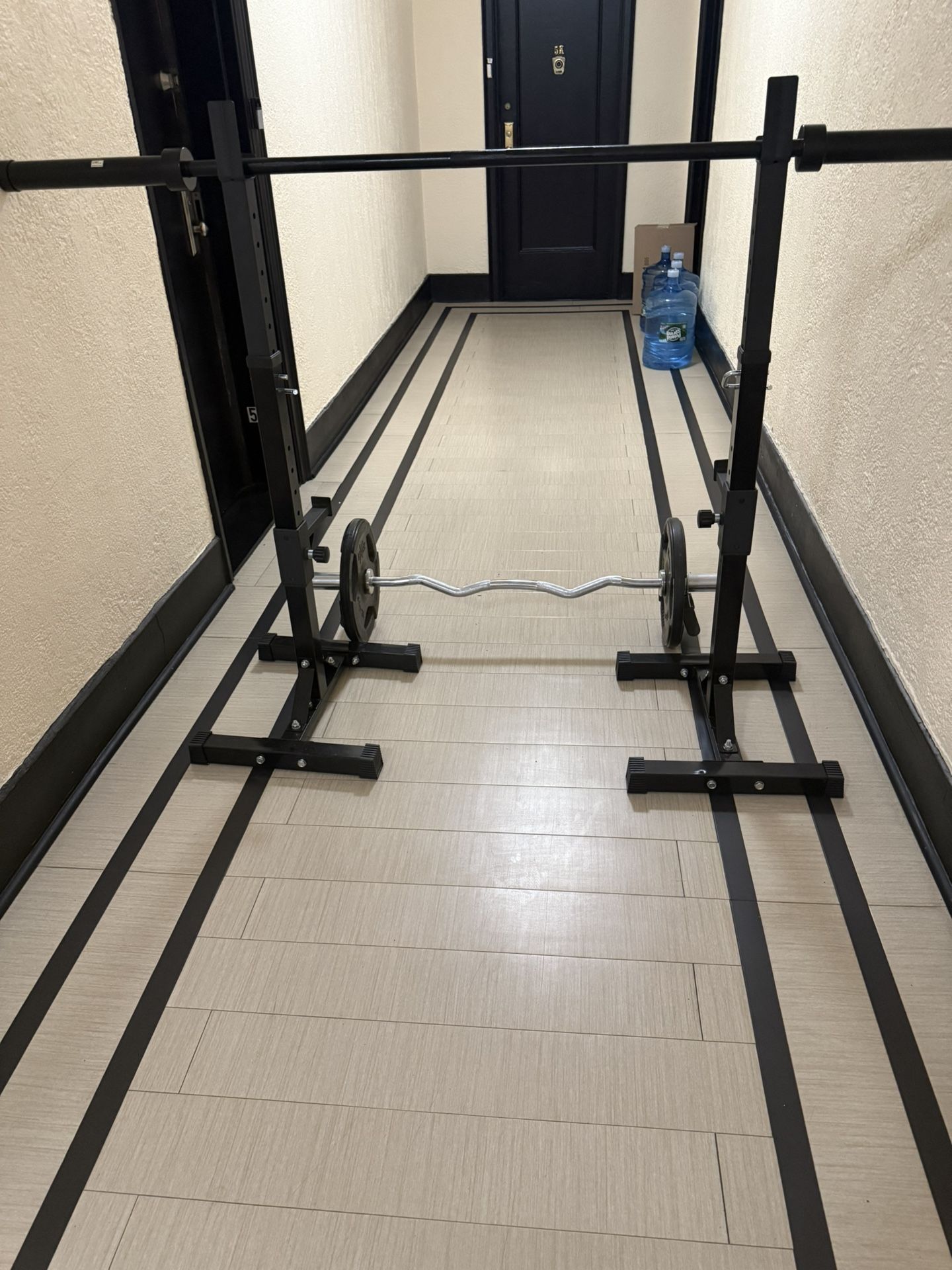 Squat Rack With 6’Olympic Barbell And 2 Rubber Coated (25 lbs) Olympic Weight Plates