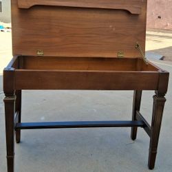 Beautiful real wooden piano bench with handy built-in storage perfect for music books, sheet music, and accessories. Solid construction and timeless d