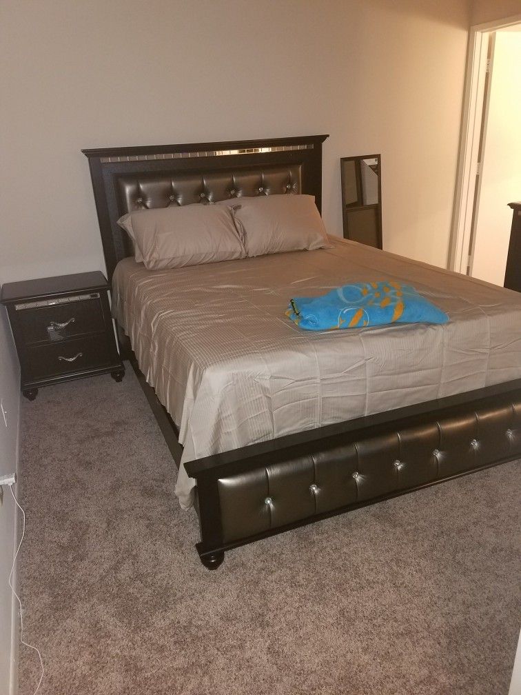 Black Queen Bed with Nightstand and Dresser and Mirror
