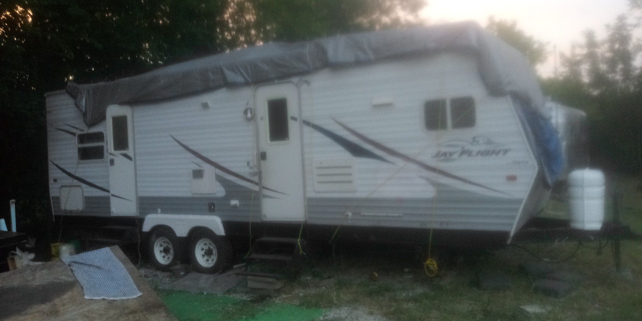 2006 31ft. Jay Flight Travel trailer with pop-out. Needs minor repairs. $2000 or best offer. Please contact Henry or Tammy {contact info removed}.