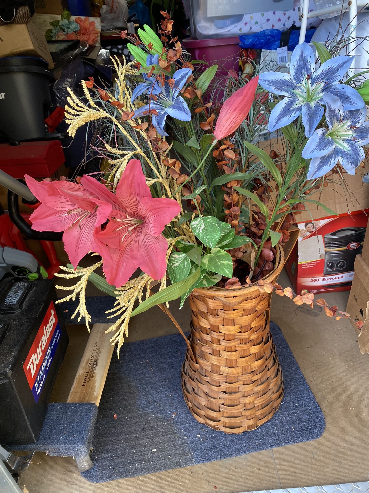 Wicker basket, vase with flowers