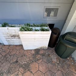 Planters And Rubbermaid Trash Bins