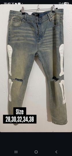 AMIRI LIGHT BLUE BONE PATCH DISTRESSED DENIM JEANS NEW COLLECTION