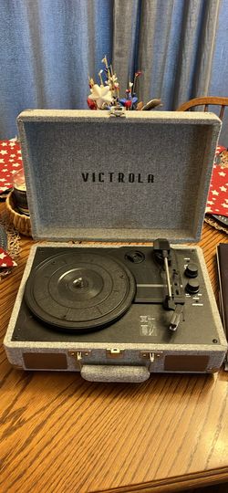Victrola record players and set of records