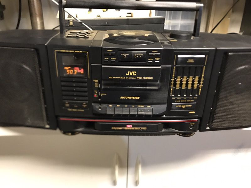 This is a vintage JVC PC-X200 stereo boombox with CD player, cassette player/ recorder, and AM/FM tuner.