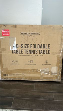 Foldable tennis table