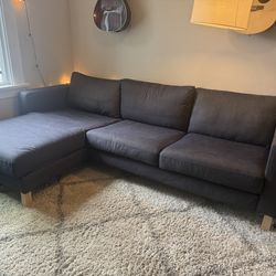 Grey couch with chase