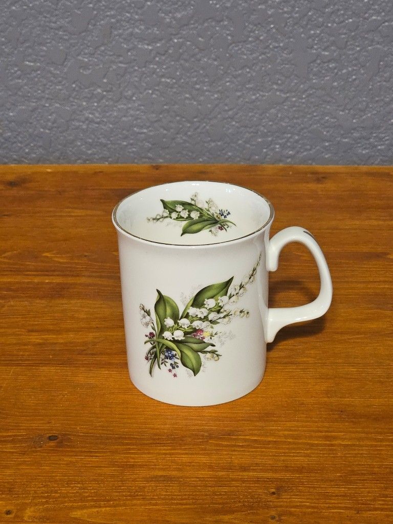 Sheltonian China Coffee Mug English Lily Of The Valley Bone China Gold Trim This beautiful bone china coffee mug by Sheltonian features a classic