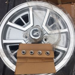 BRAND NEW FROM NISSAN FACTORY ONE DATSUN 280-ZX 4-SPOKE ALUMINUM RIM 1979/1983-$100.00