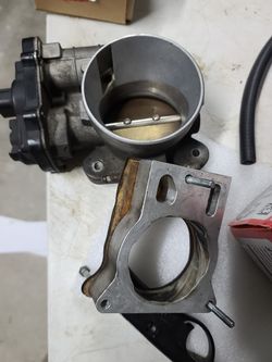 Oem throttle body and intake manifold, throttle body spacer