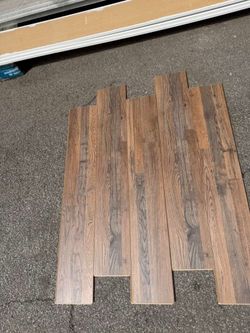 $0.75/sqft - Rustic Mahogany Luxury Laminate Flooring