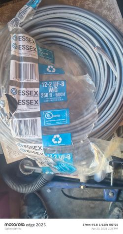 New 250 ft Roll Essex 12-2 UF-B Wire w/ Ground Direct Burial Outdoor. Plastic has ripped from sitting and being moved around
