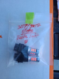 Brand new pair of 3057/3157 red strobe brake bulbs