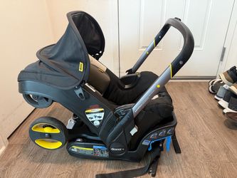 Doona+ Exp 2030 Car seat/ Stroller + Base