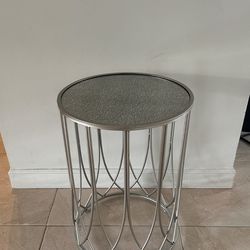 grey metal mirror top table
