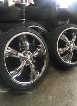 20” chrome wheels and tires