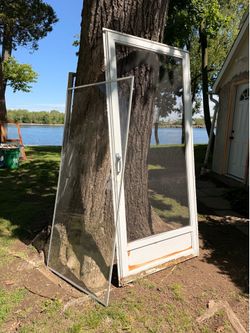 Storm door with glass and screen