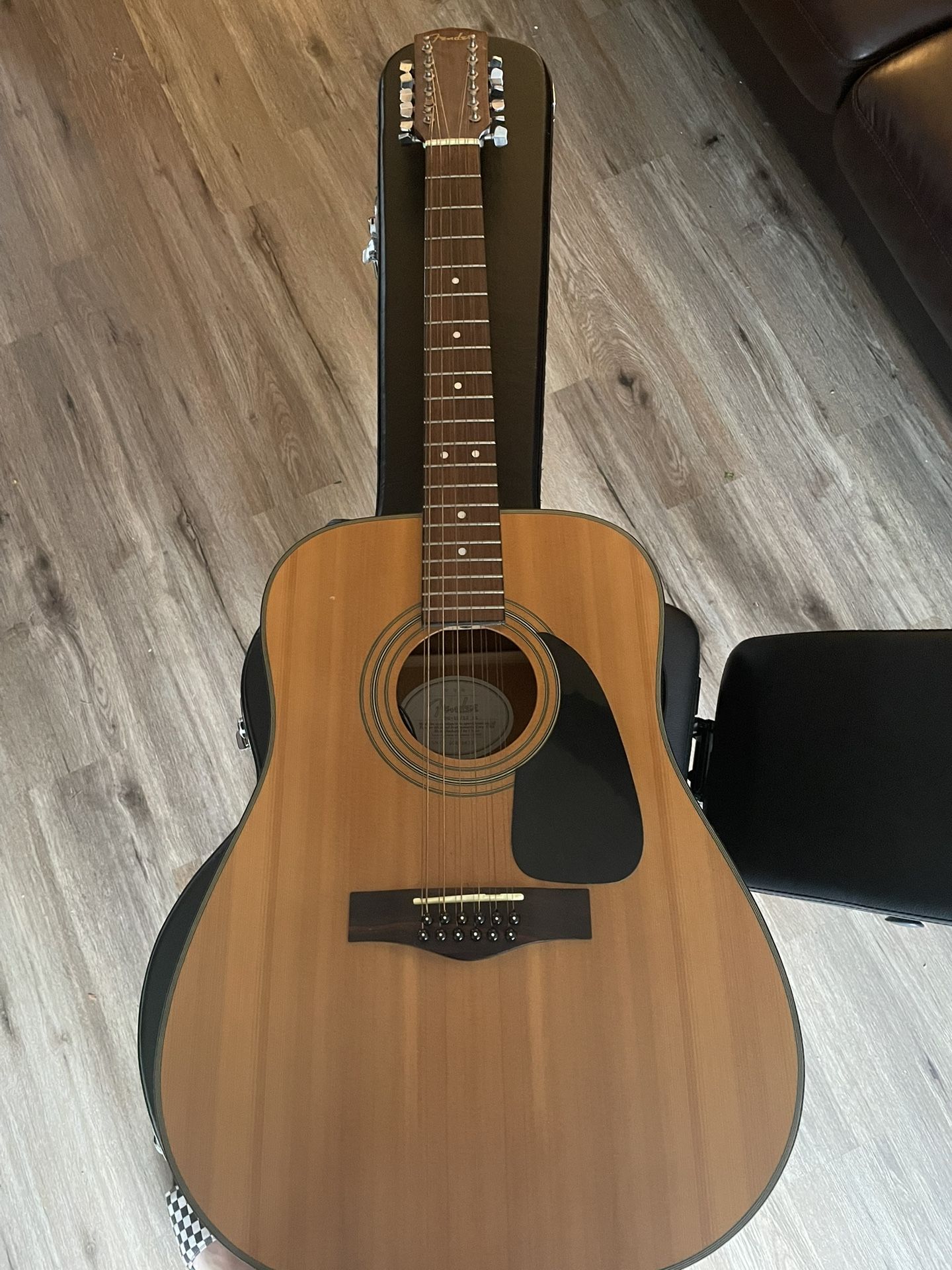 Fender DG-10 12-string acoustic guitar with pickup and case