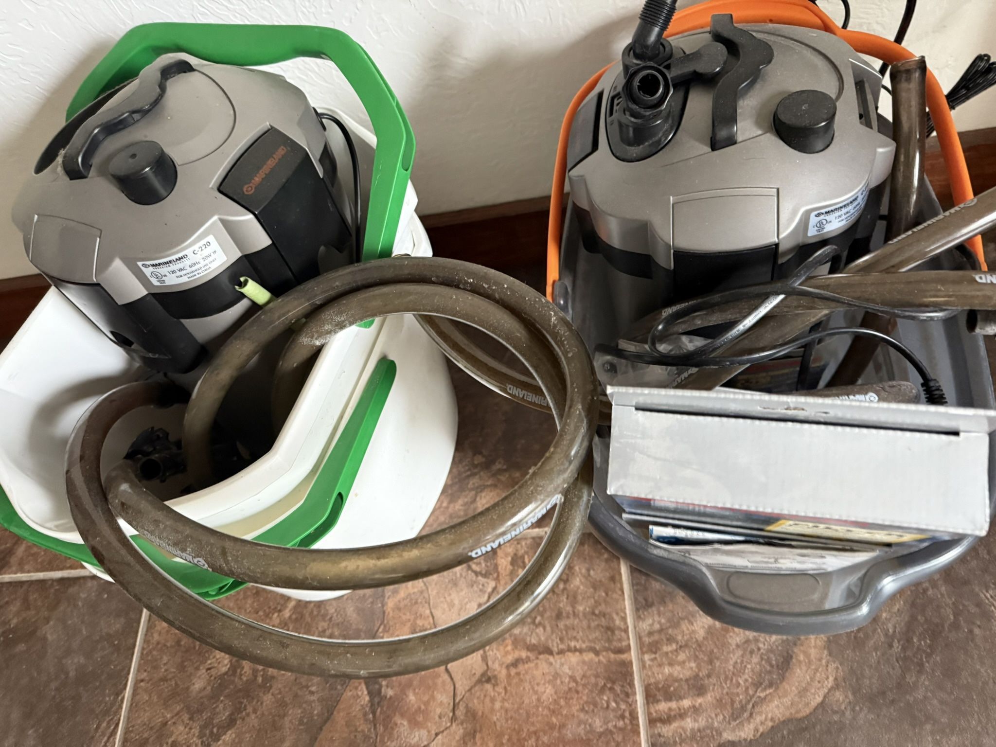 Two Marineland C220 canister aquarium filters plus extra media