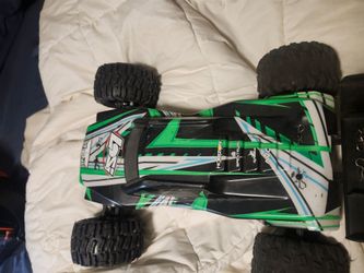2 RC  cars Ten MT 4×4s and rock crawler