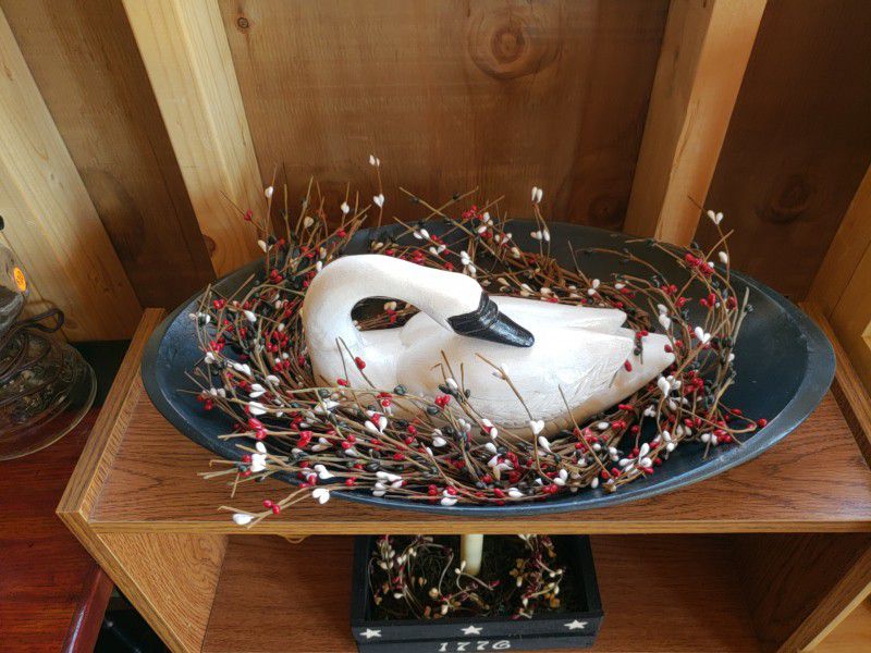 Wooden dough bowl with wooden swan