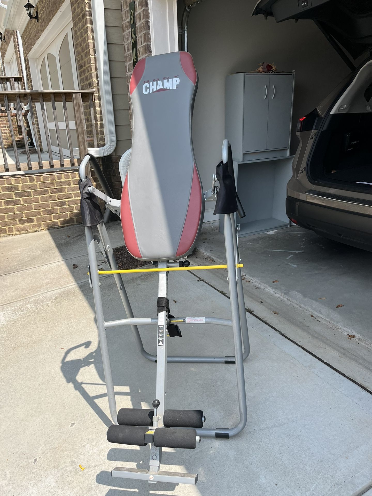 Inversion tables For Back Pain Relief And A Cabinet