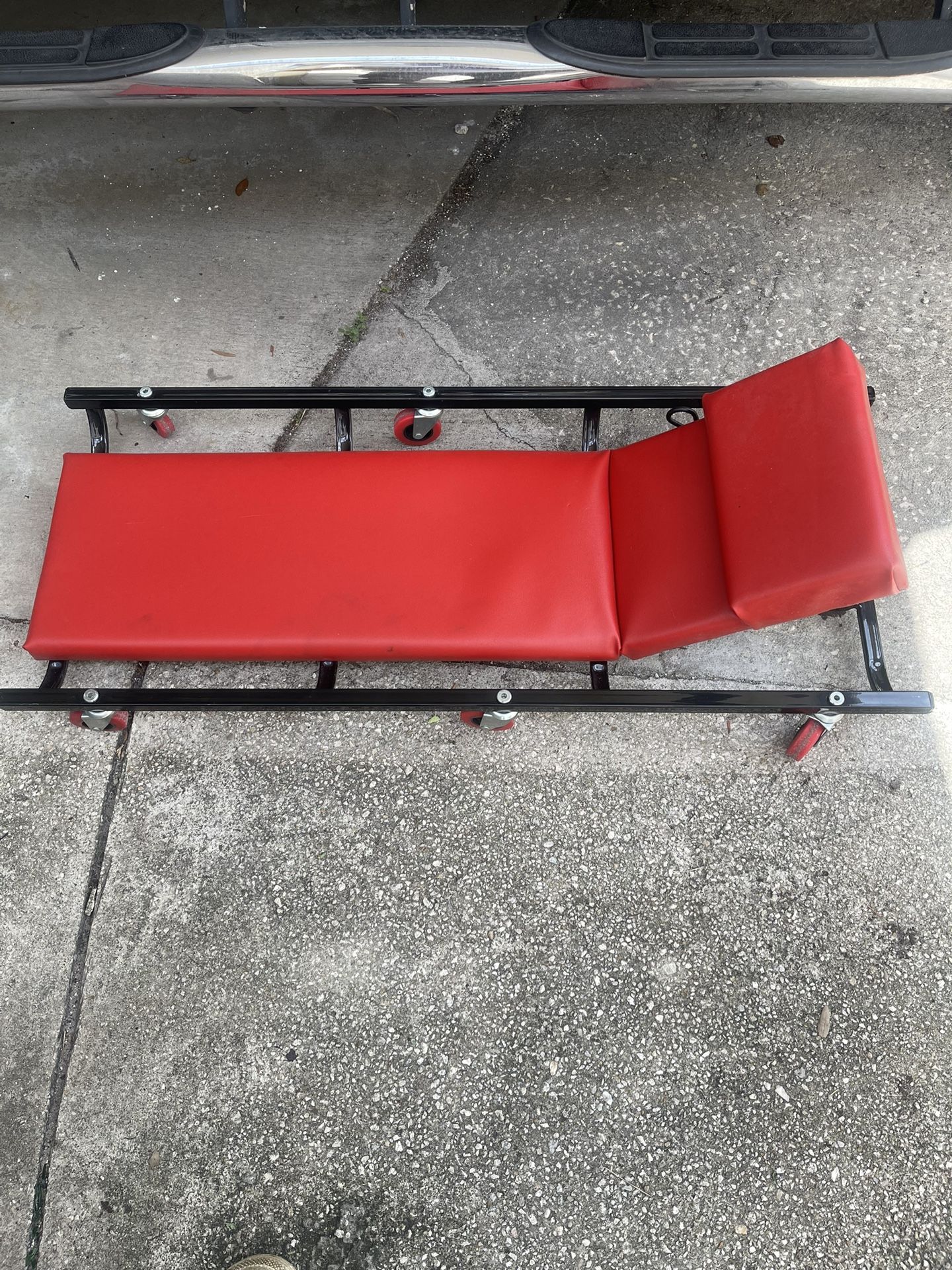 Creeper With Adjustable Headrest