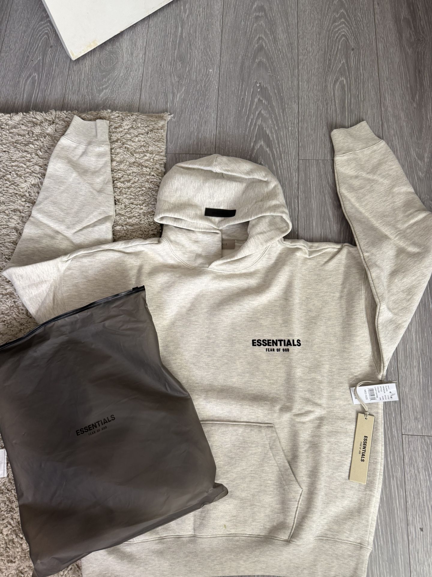 light oat essentials hoodie