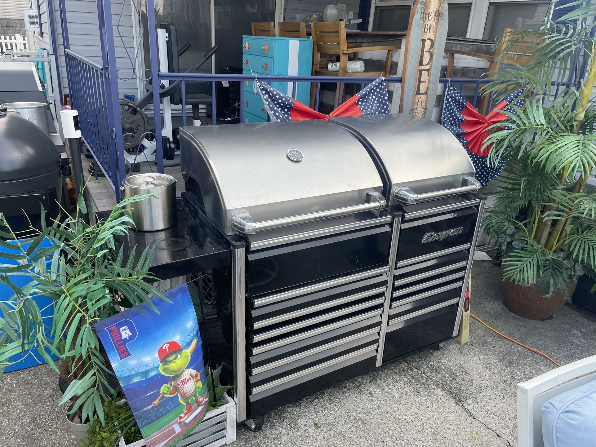 Snap on 65 inch toolbox propane, barbecue grill with built in refrigerator. Excellent condition.