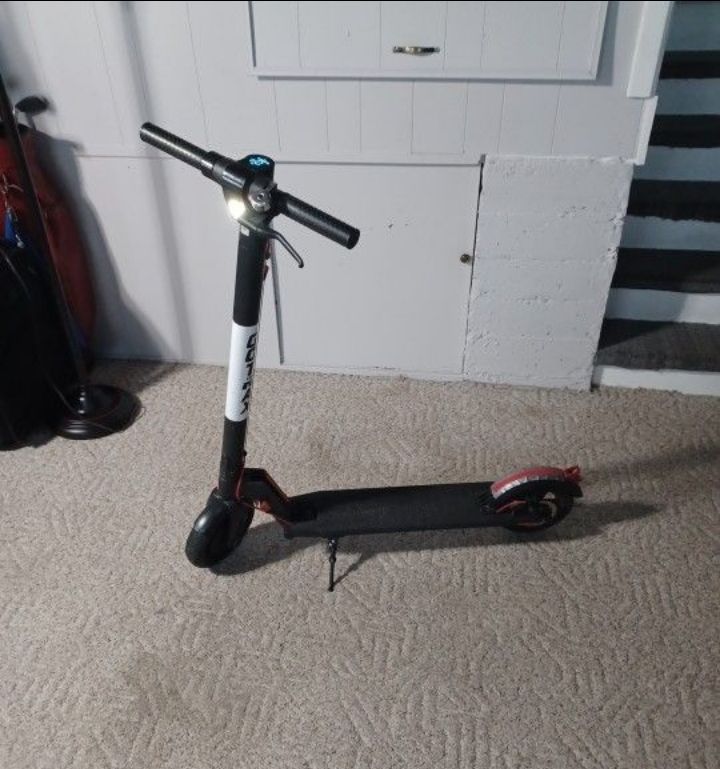 Gotrax Elec. Scooter With Charger And Manual