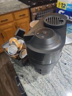 Nespresso maker with coffee