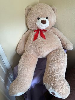 Giant Plush Teddy Bear with Red Bow
