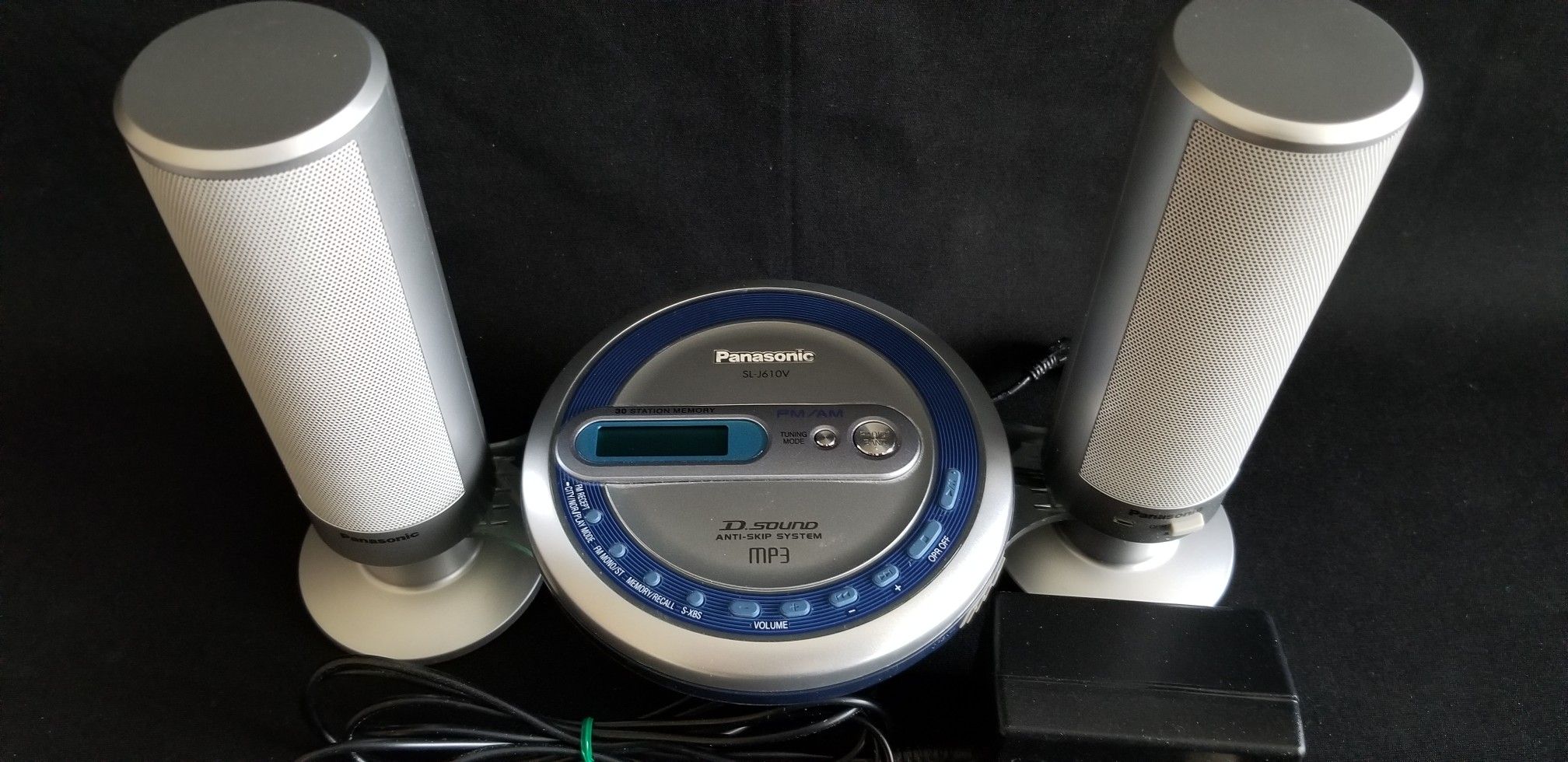 Panasonic Portable CD Player with AM/FM radio and separate base unit with external speakers.
