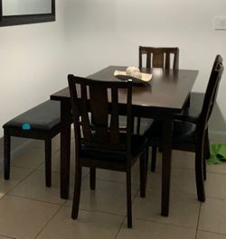 Dinning table with bench and chairs.