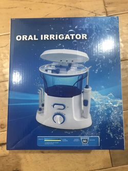 New oral irrigator