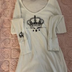 Cream long sleeve shirt with black crown and stars 