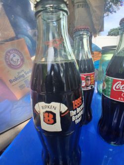 Various vintage Coca-Cola bottles