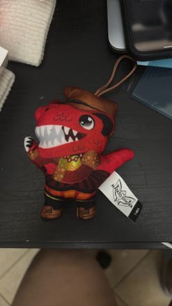 Masked singer T-Rex bag clip