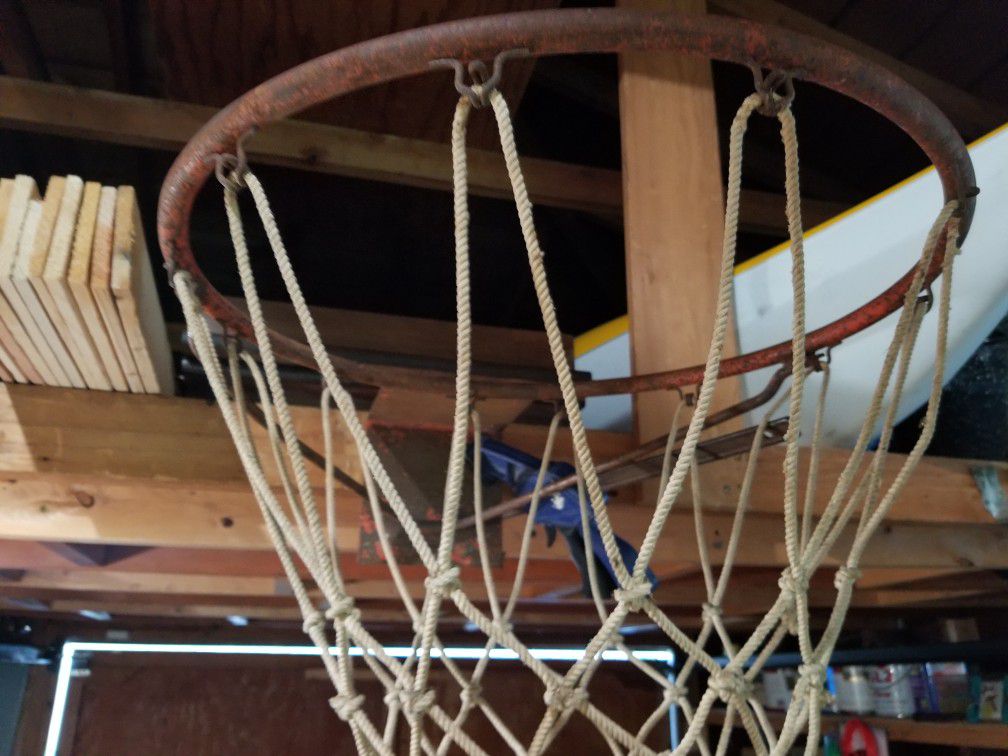 Vintage basketball hoop. Needs some paint
