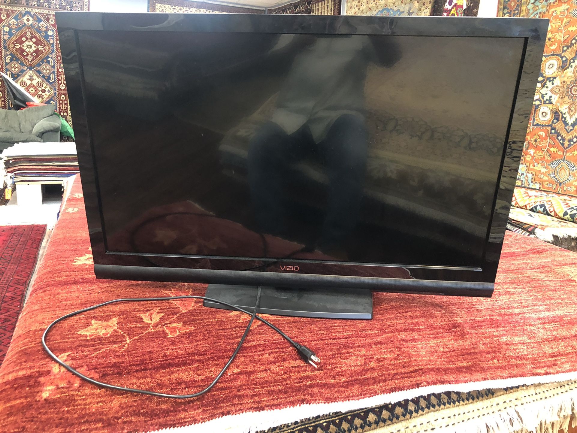 T V