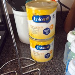2 Unopened Cans Of formula 