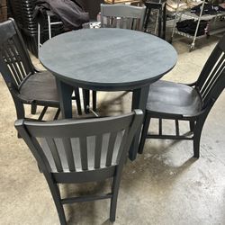 Table And Four Chairs