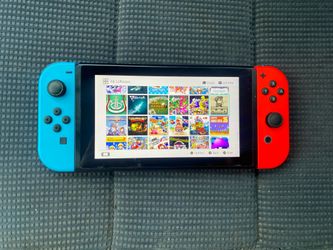 NINTENDO SWITCH OLED with 125 POPULAR SWITCH GAMES
