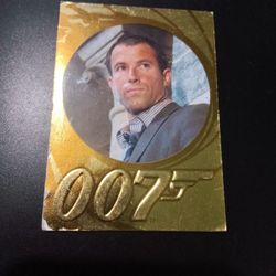12012 Rittenhouse, James Bond "50" Anniversary  #191 Quantum Of Solace Holographic Gold.