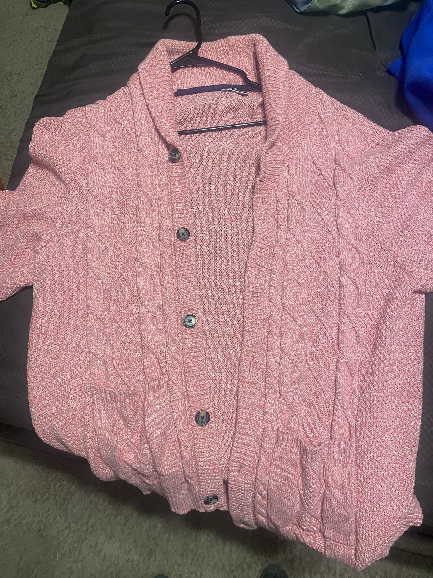 Salmon, pink cardigan