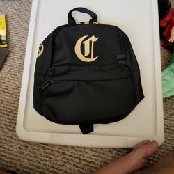 Small CHAMPION BLACK AND GOLD BACKPACK
