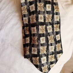 Joseph Abboud Silk Necktie W/ Black & Gold Geometric And Floral Pattern.